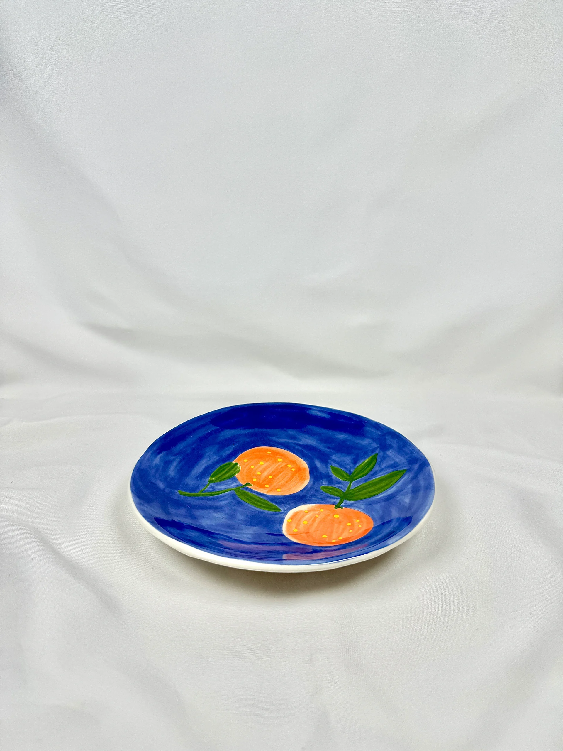 Plato Naranjas Azul Oscuro